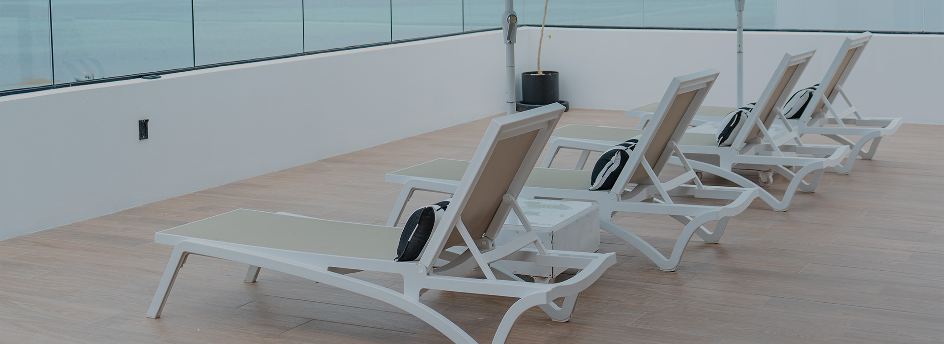 a group of chairs on a deck