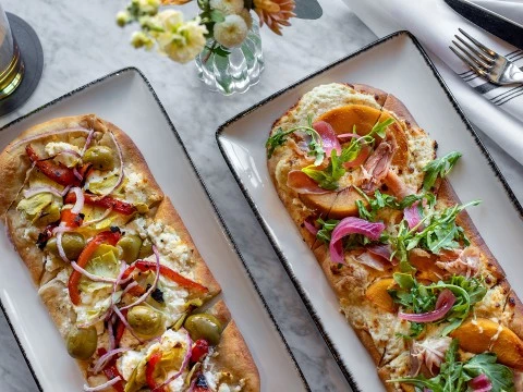 two plates of food on a table