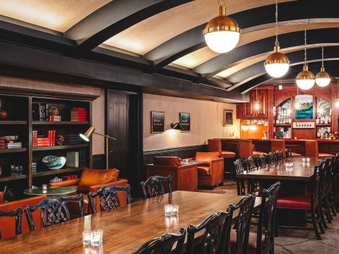 a room with tables and chairs