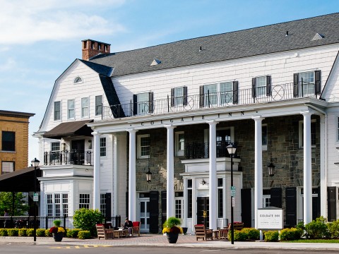 a building with columns and a street corner