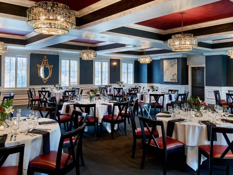 a room with tables and chairs