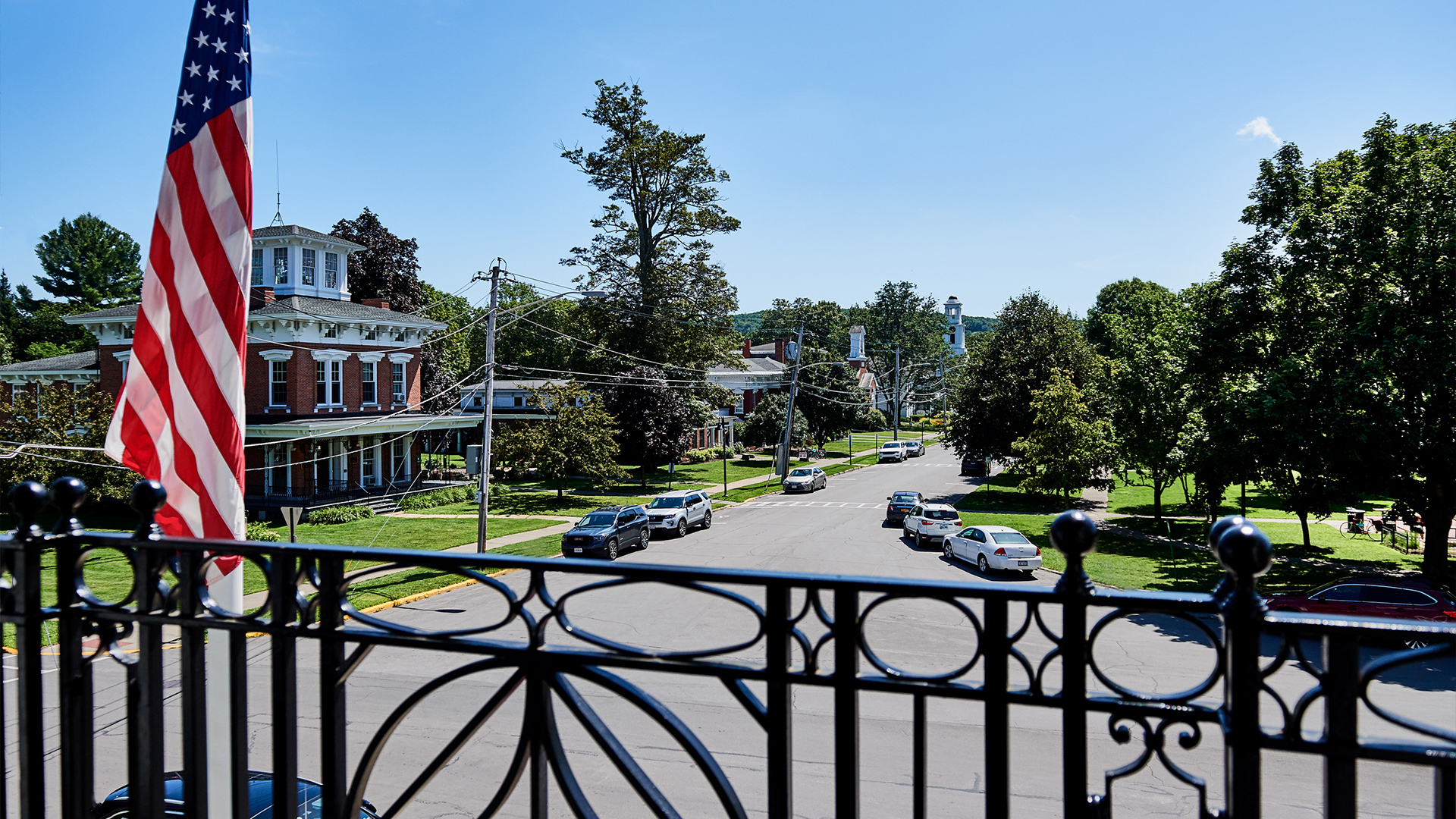 a view of a street from a balcony