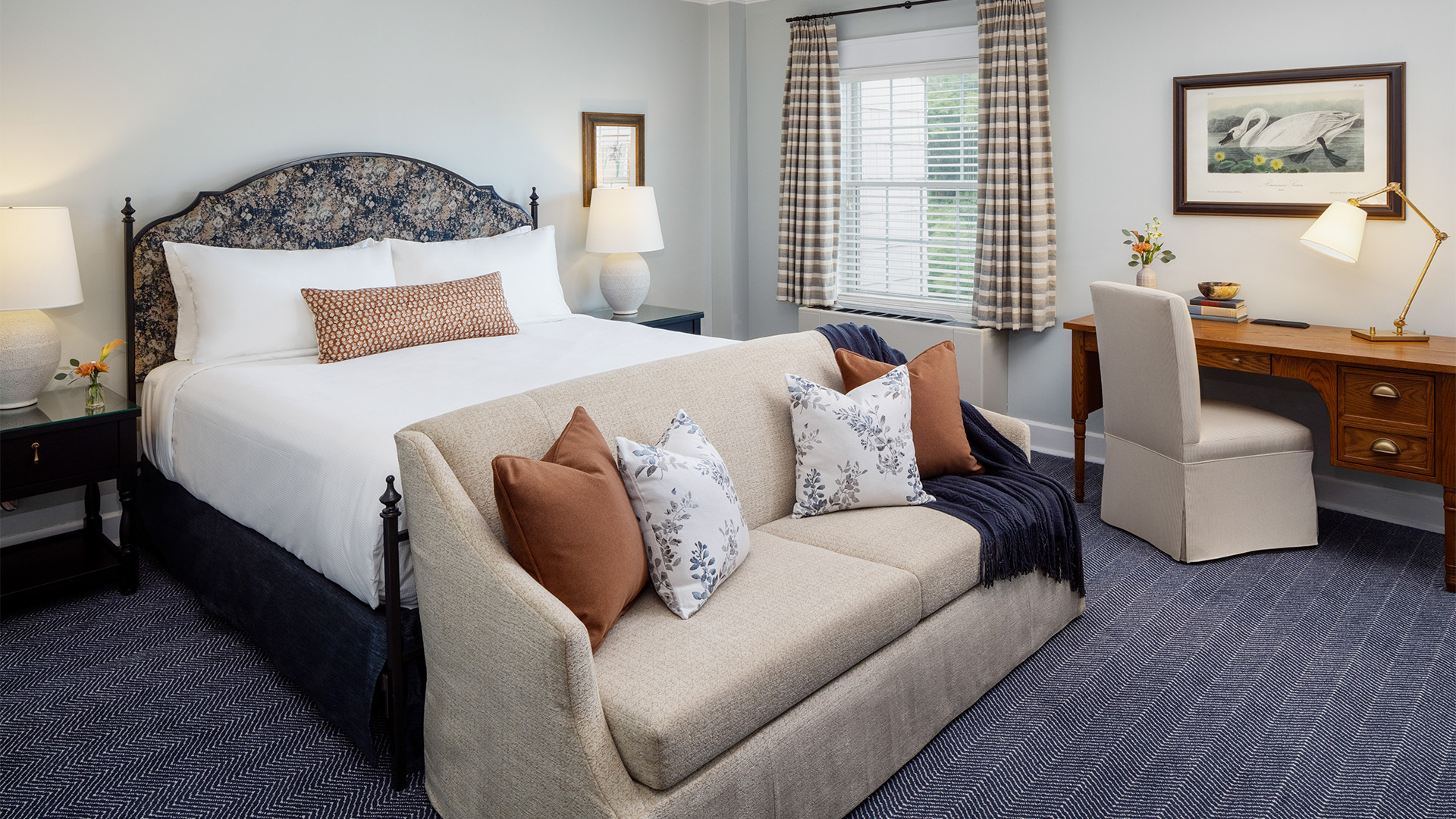 a bed and a couch in a room