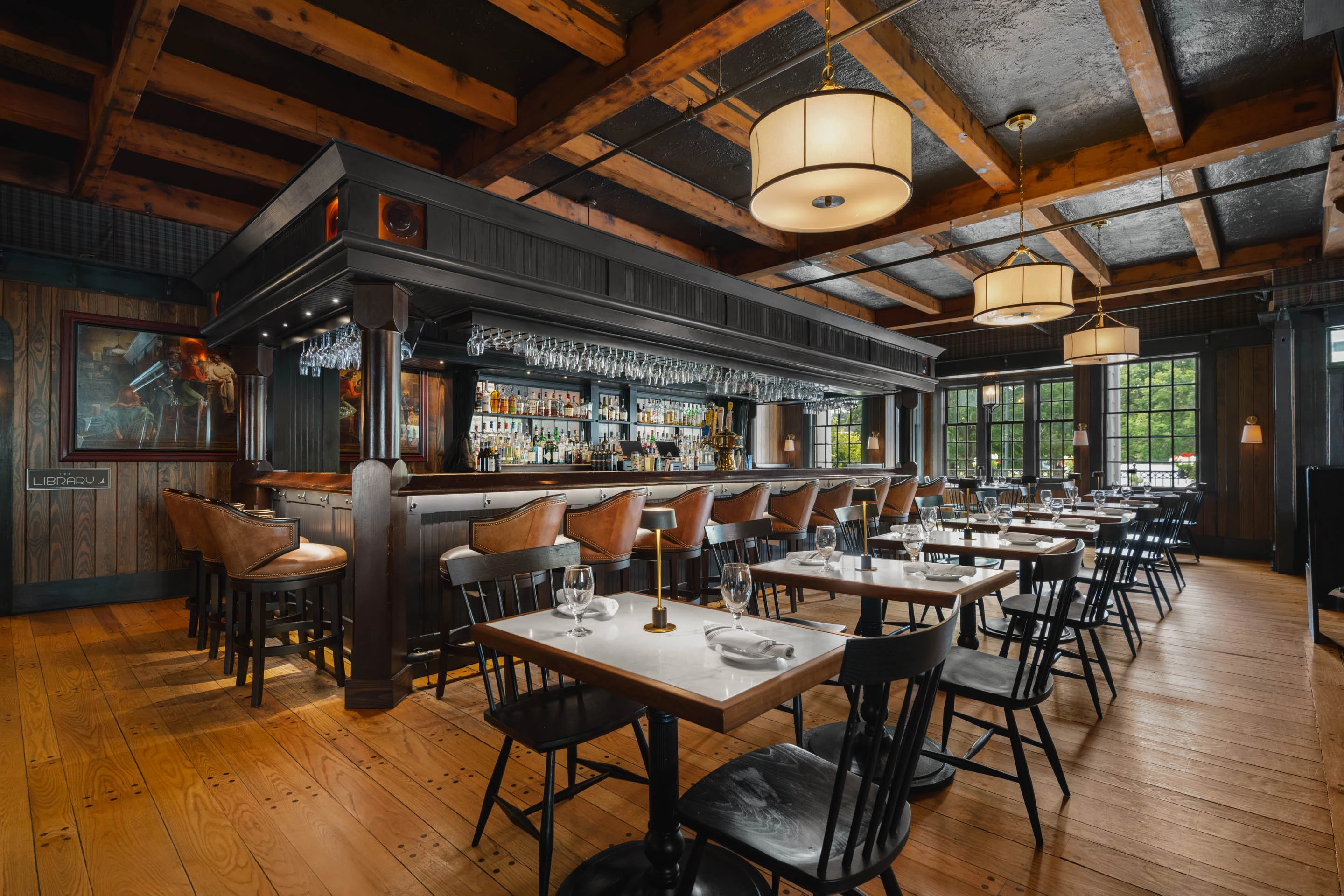 a restaurant with tables and chairs