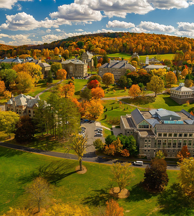 a group of buildings and trees in a park