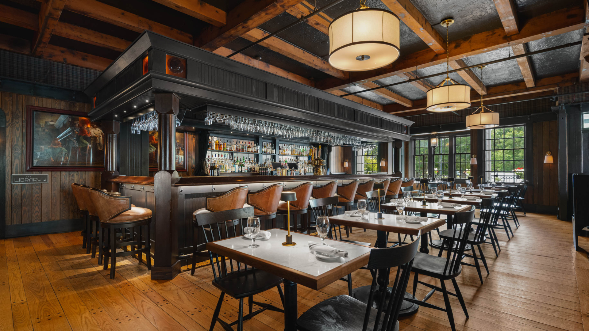 a restaurant with tables and chairs