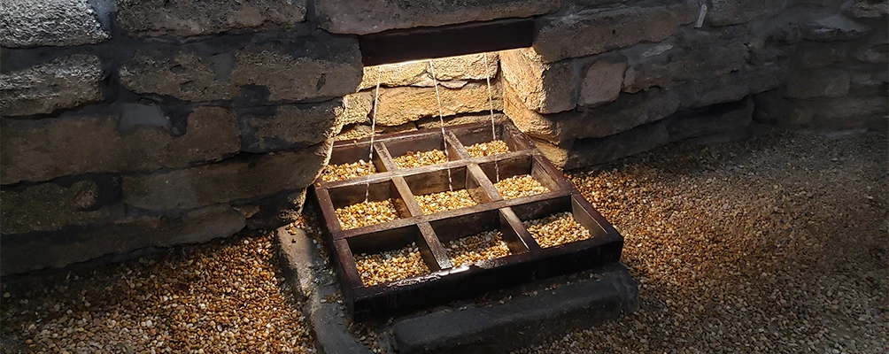 a grate between rocks