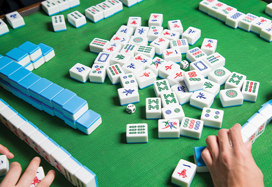 a person playing mahjong