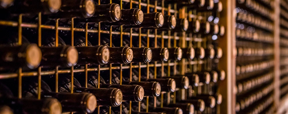 a large collection of wine bottles