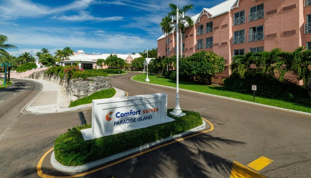 a sign in front of a hotel