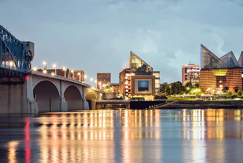 view of city in the distance past the river