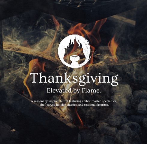 a fire with a grill and a logo