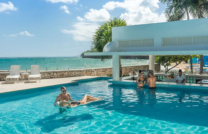a group of people in a pool