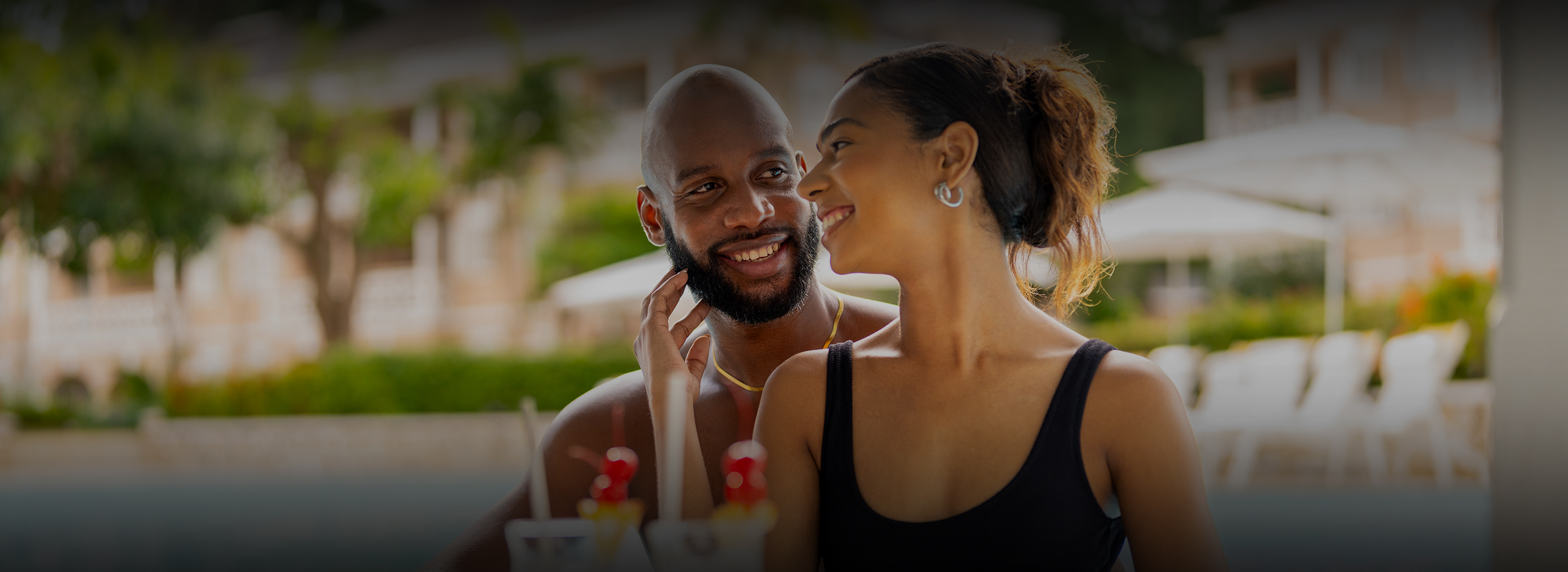 a man and woman smiling