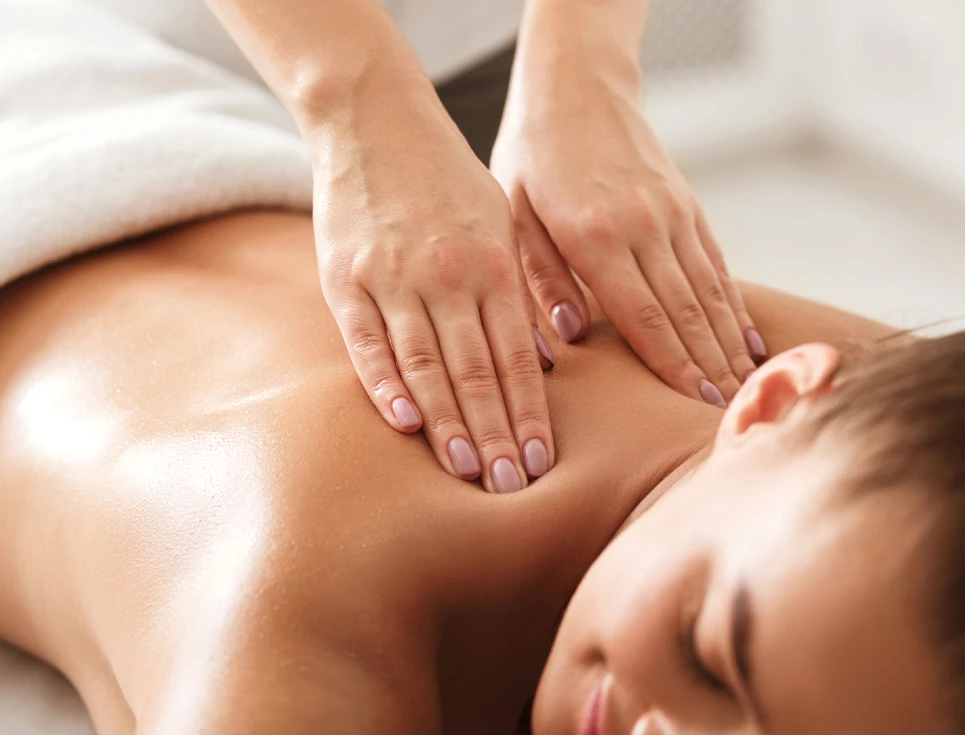 a person receiving a back massage