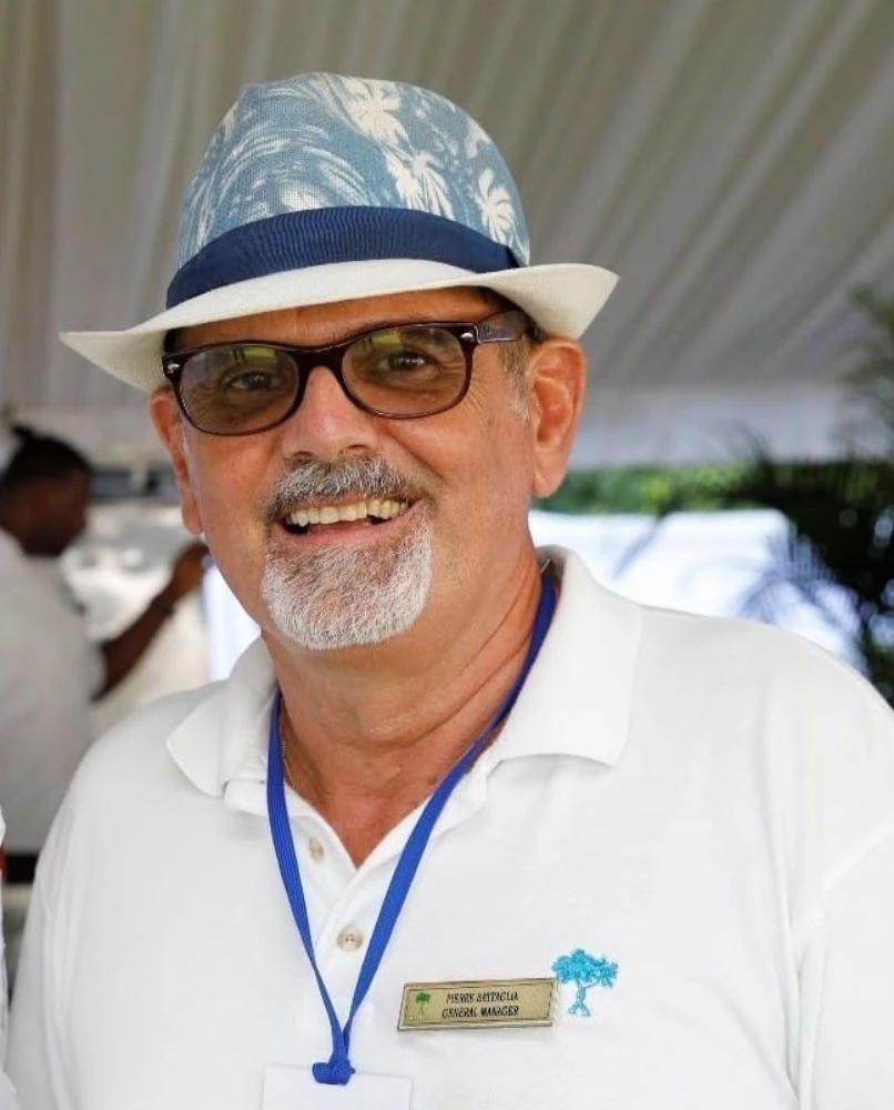 a man wearing a hat and glasses