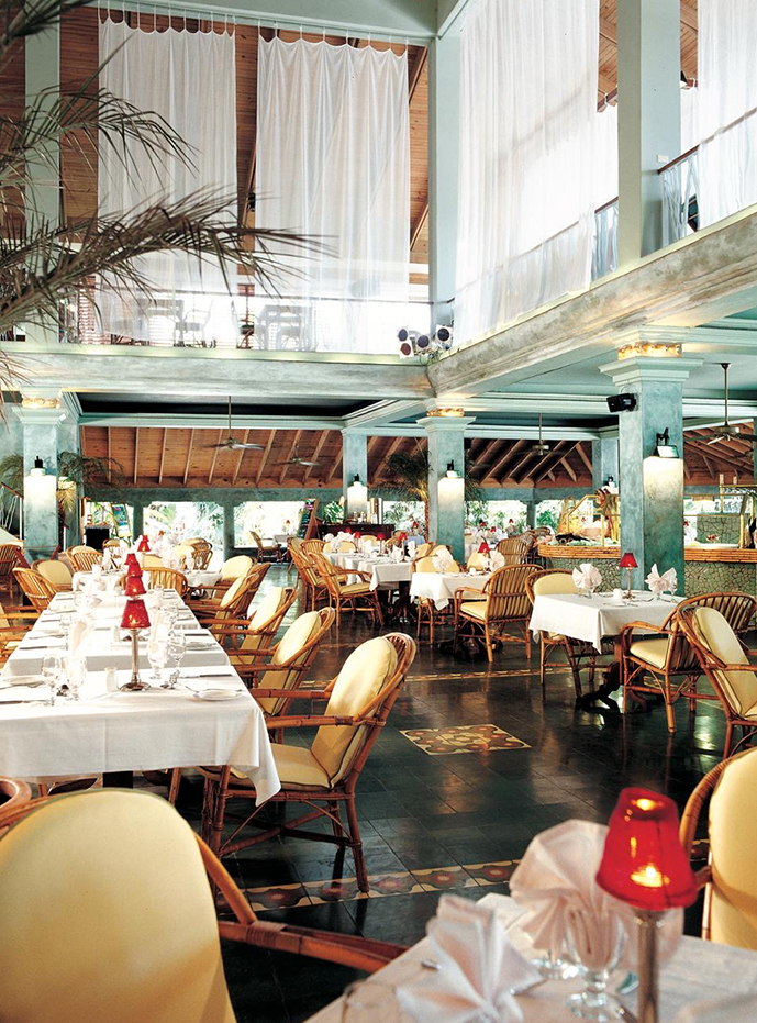 a large room with tables and chairs