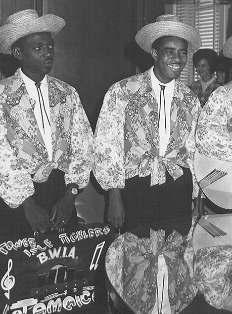 a group of men wearing matching outfits