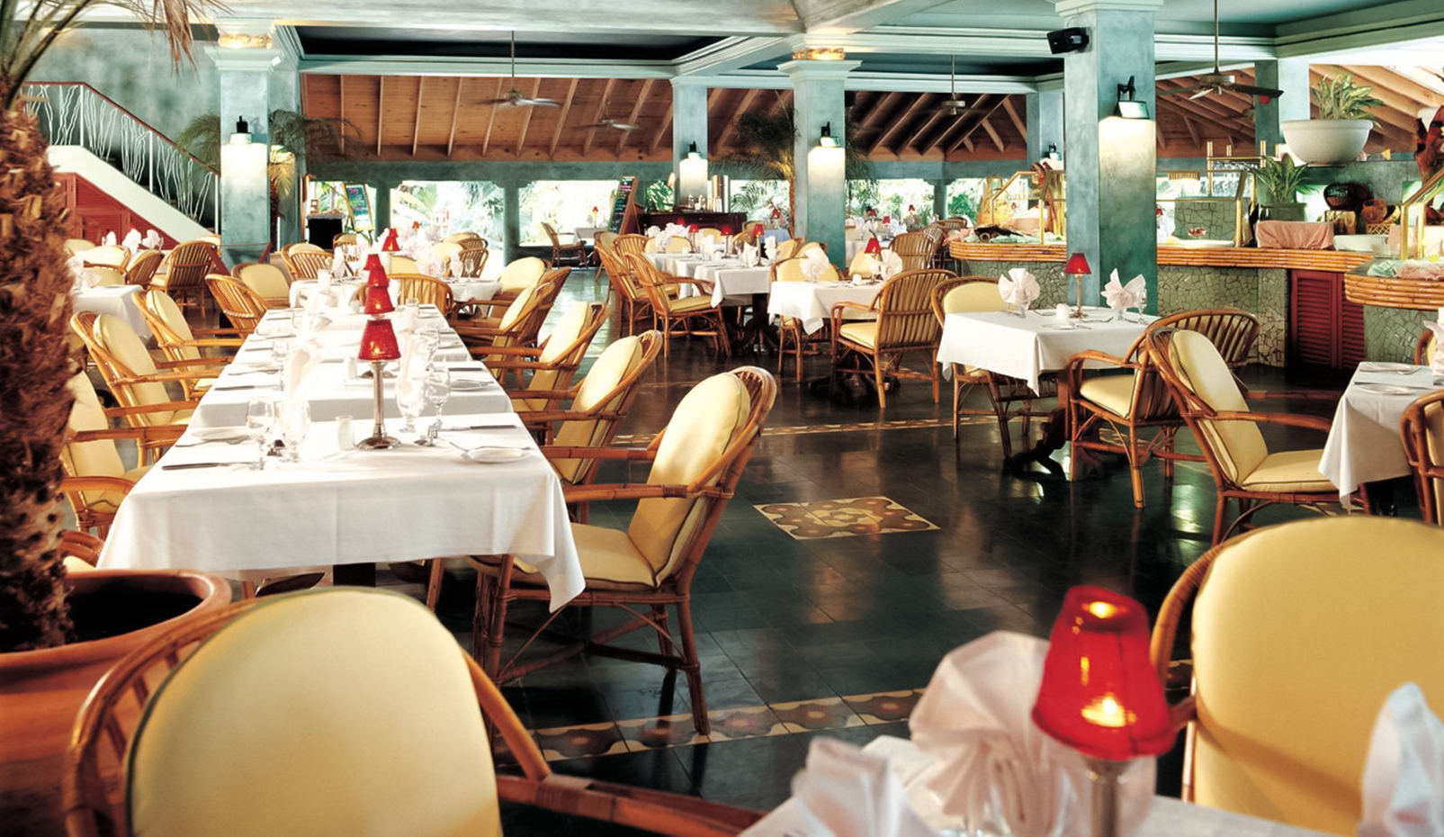 a restaurant with tables and chairs