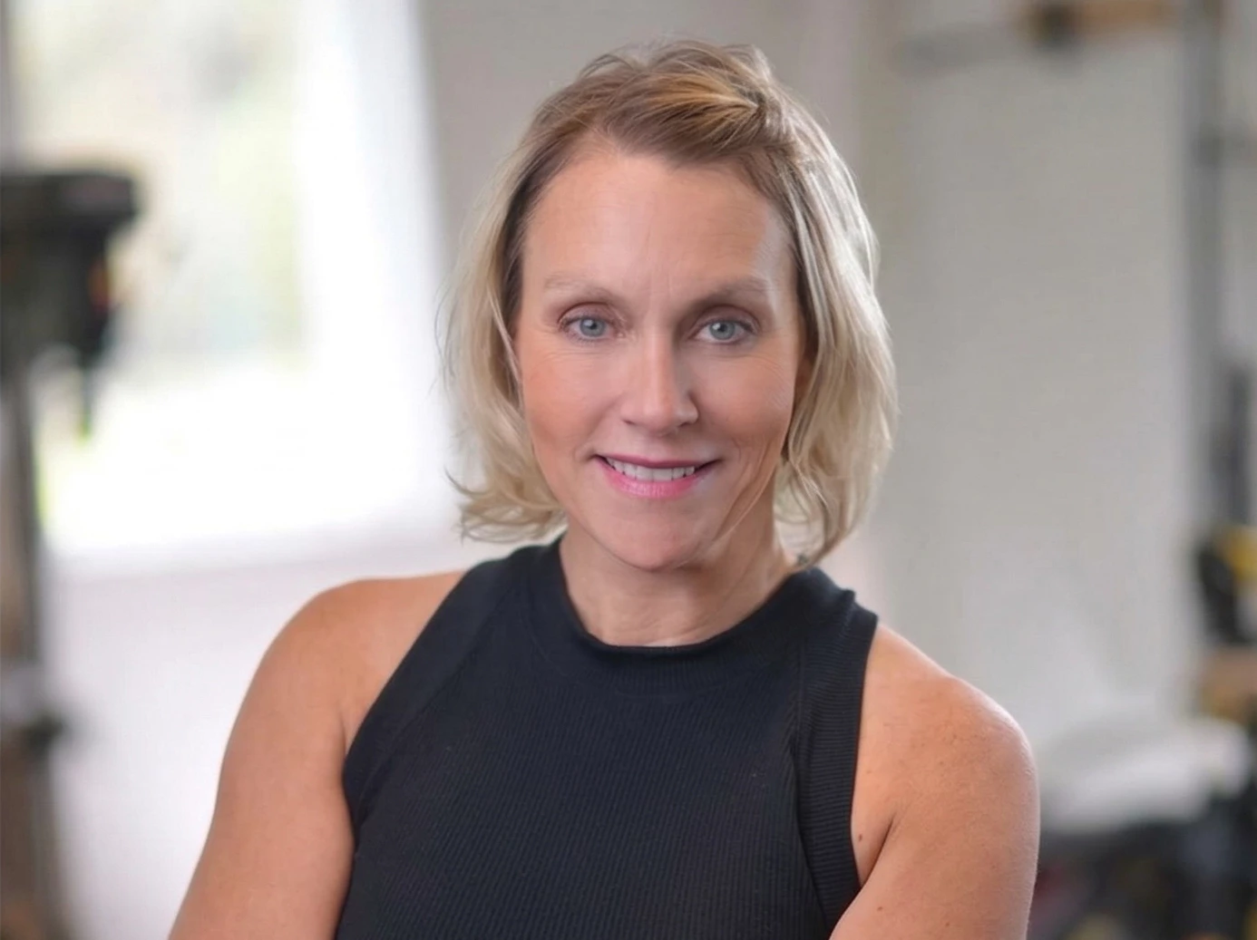 a woman smiling at camera