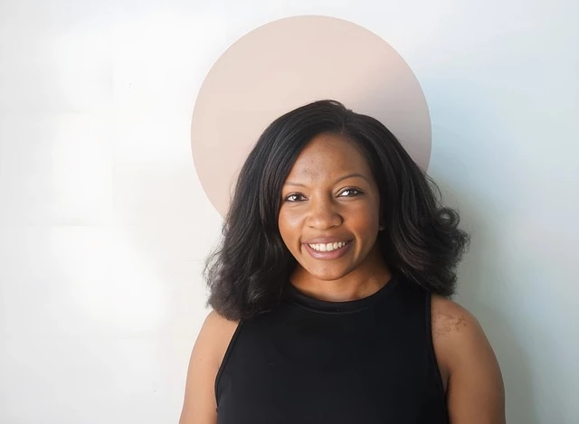 a woman smiling at camera