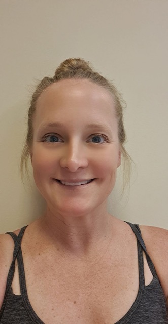 a woman smiling for the camera