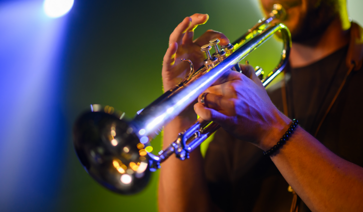 a person playing a trumpet