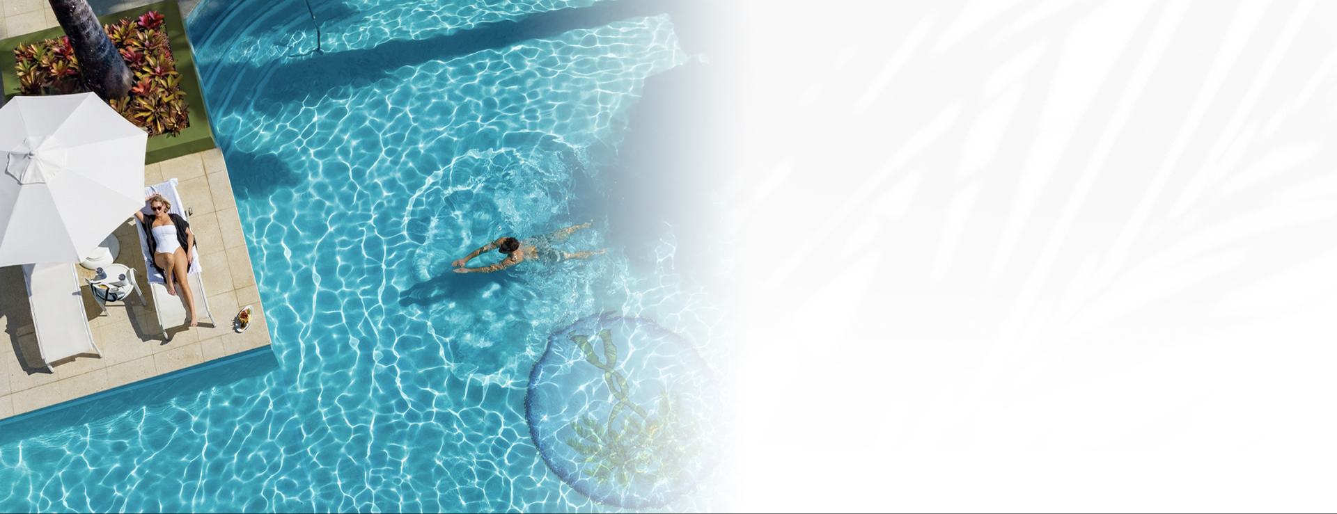 a person swimming in a pool