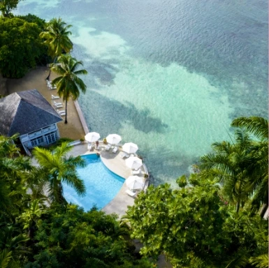 a pool next to a body of water