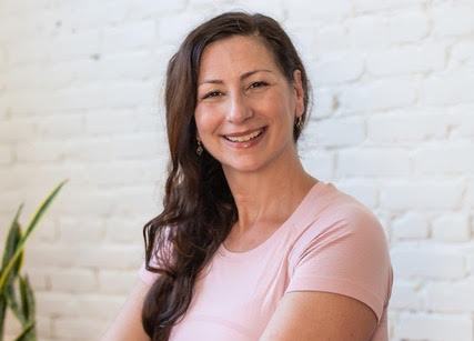 a woman smiling at camera