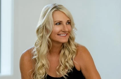 a woman with long blonde hair