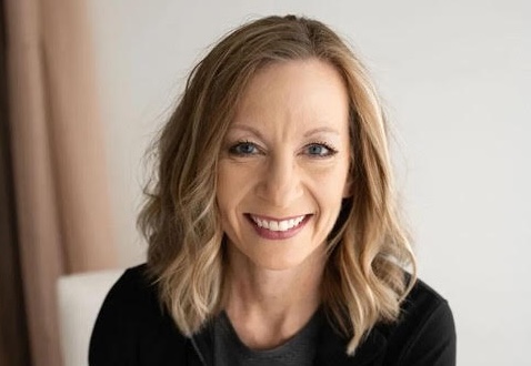 a woman smiling at camera