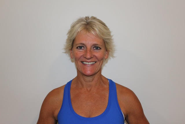 a woman smiling at camera