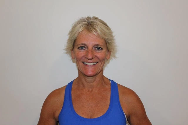 a woman smiling at camera