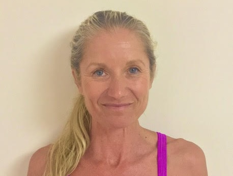 a woman smiling at the camera