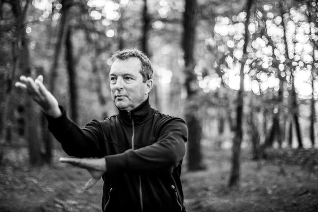 a man in a black jacket