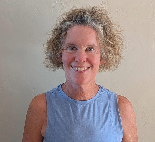 a woman smiling at camera