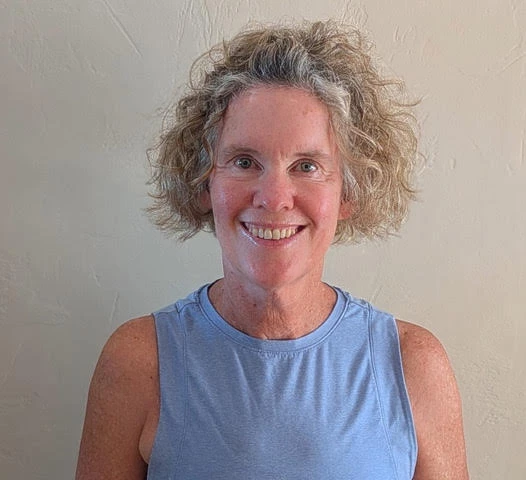 a woman smiling at camera