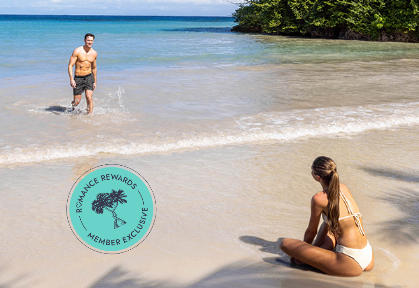 a man and woman on a beach