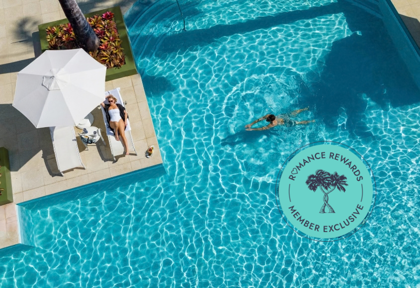 a man and woman in a pool