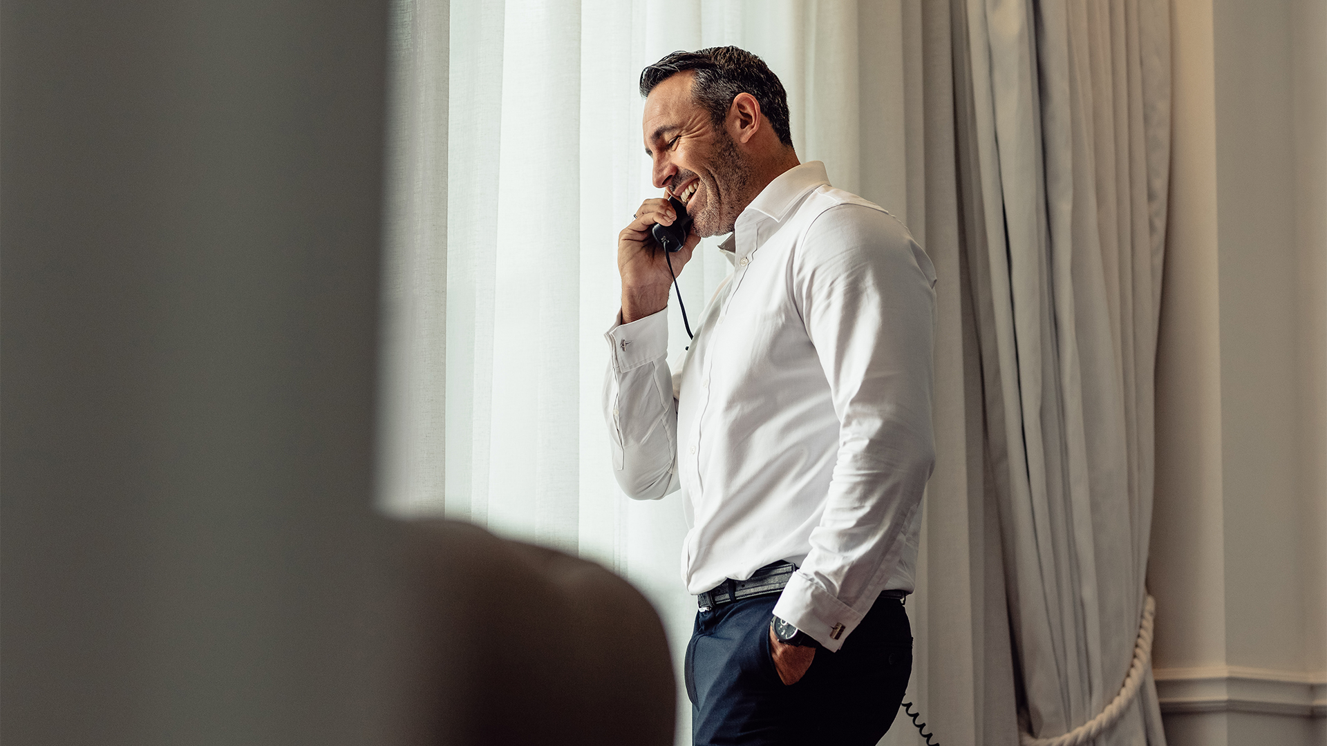 a man talking on a phone