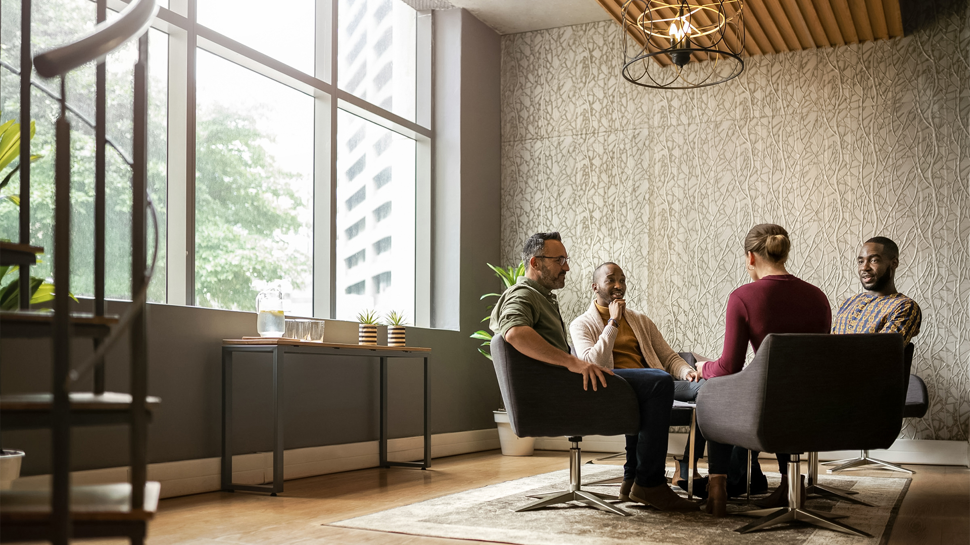 a group of people sitting in chairs