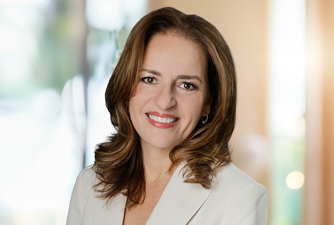a woman smiling at camera