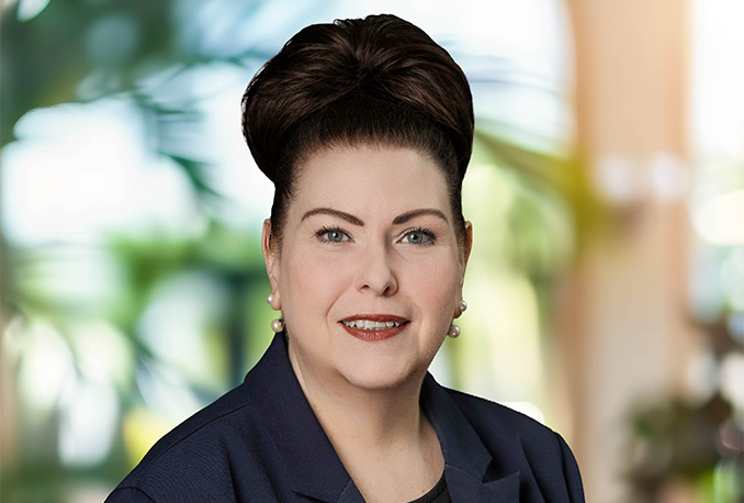 a woman with a high bun