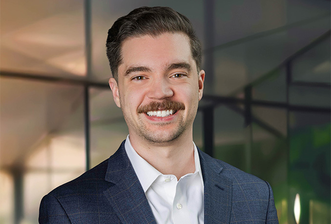 a man smiling for a picture