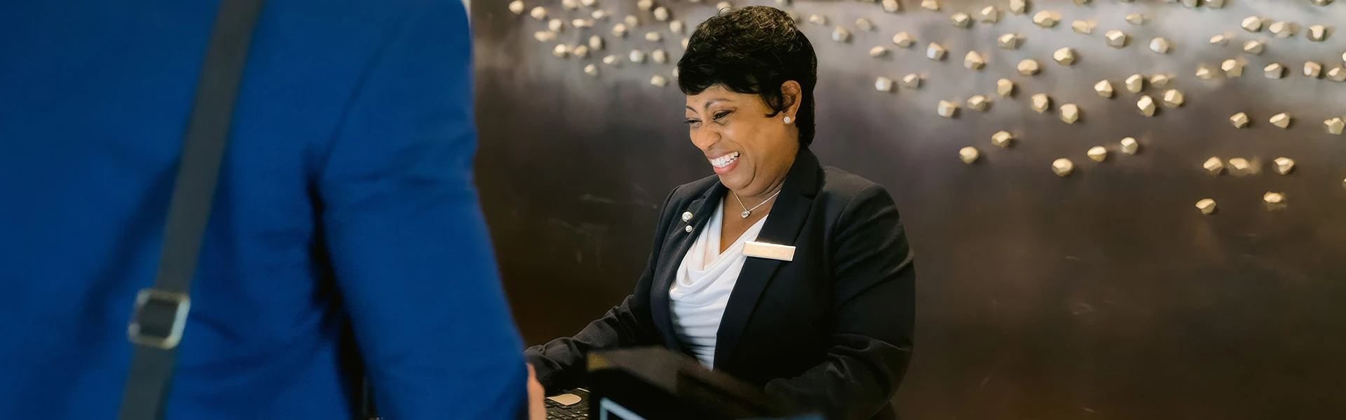 a woman smiling at a man