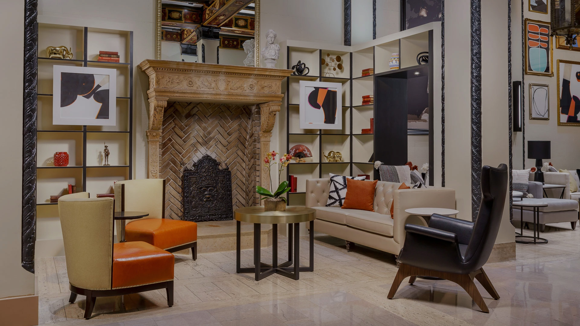 a room with a fireplace and couches