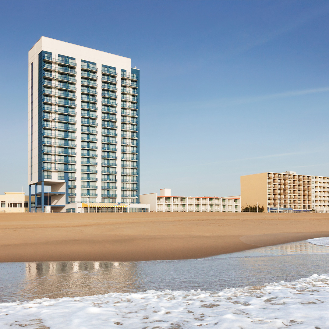 a building on a beach expanded