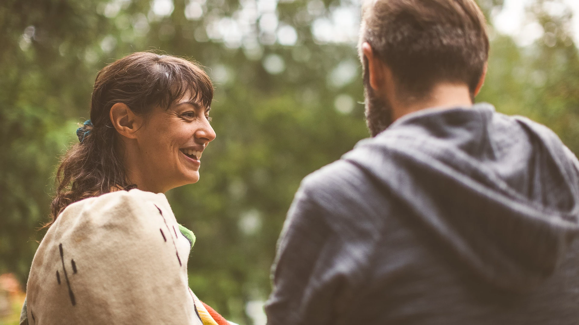 a man and woman smiling