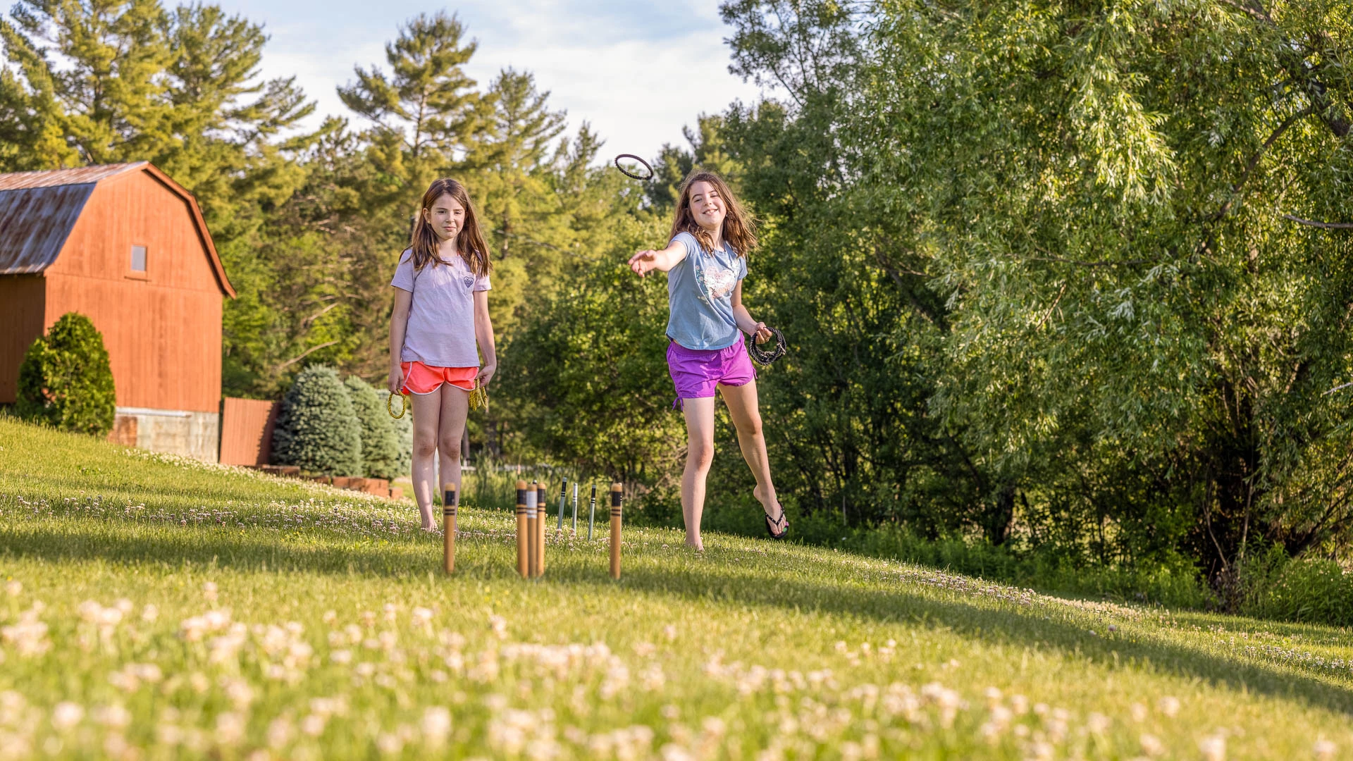 two girls playing with a racket